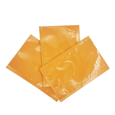 comprar Folha de alumínio laminada de cor laranja brilhante Bolsas planas personalizadas para folha de máscara facial, embalagem de creme facial online manufacture